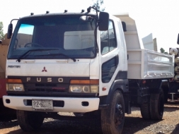 รถบรรทุก 6 ล้อดั๊มพ์ ยี่ห้อ MITSUBISHI รุ่น FUSO เครืองยนต์และดั๊มพ์ใช้งานได้ปกติ เล่มทะเบียนพร้อมโอ